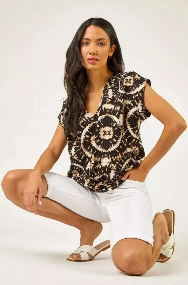 Model wearing Essential Stretch Knee Length Shorts