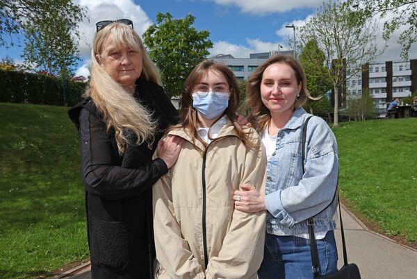 (Left to right) Fiona Corcaran of the Greater Chernobyl Cause with Nayle Mametova and her mum, Zenure Mametova. 'This family are yearning for that connection because they are missing their grandparents so much.' Picture: Jim Coughlan